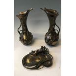 A pair of art nouveau style bronzed finished jugs with leaf design together with an art nouveau