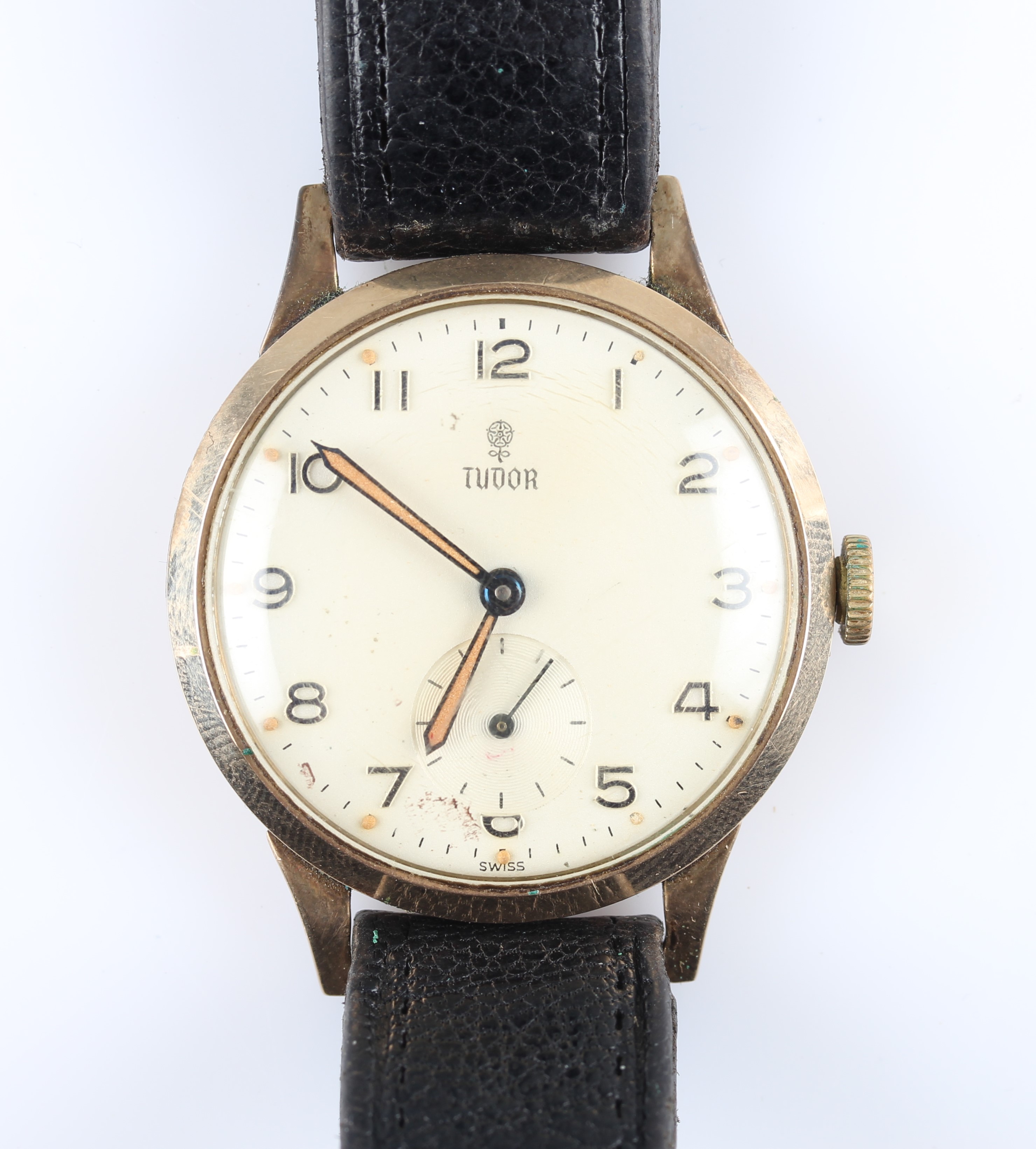 A 9ct yellow gold cased gents Tudor wrist watch, the cream dial having hourly Arabic numeral markers