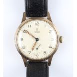 A 9ct yellow gold cased gents Tudor wrist watch, the cream dial having hourly Arabic numeral markers