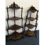 Two Victorian walnut four tier whatnots with pierced decoration to both.