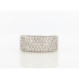 A diamond half band, pavé set with seven rows of round brilliant cut diamonds, total diamond