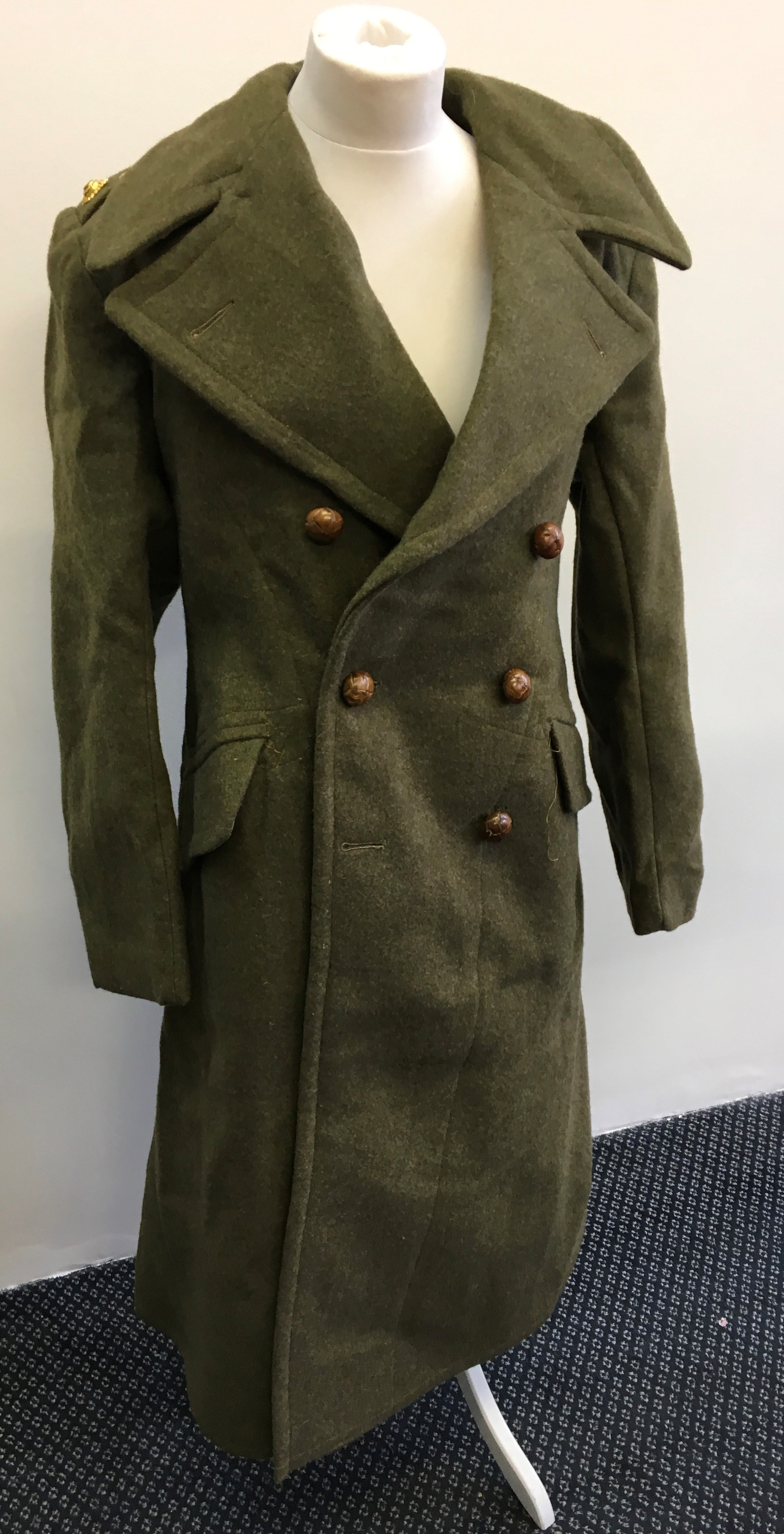 *A replica WW2 full length green wool coat with label inside.