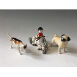 A group of three Beswick figures to include two dogs and “Kick Start” horse and jockey.
