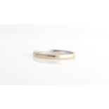 A hallmarked 18ct white gold wedding band.