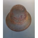 A WW1 grey painted helmet.