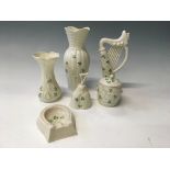 A selection of Belleek shamrock items to include a harp, horseshoe shaped dish etc. 6 items in