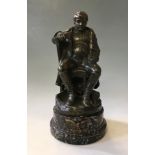 A J. E. MASSON bronze of Napoleon sitting on chair, on black marble base No. 14/1541. Total height