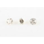 A collection of three loose diamonds to include, two round brilliant cut diamonds, measuring approx.