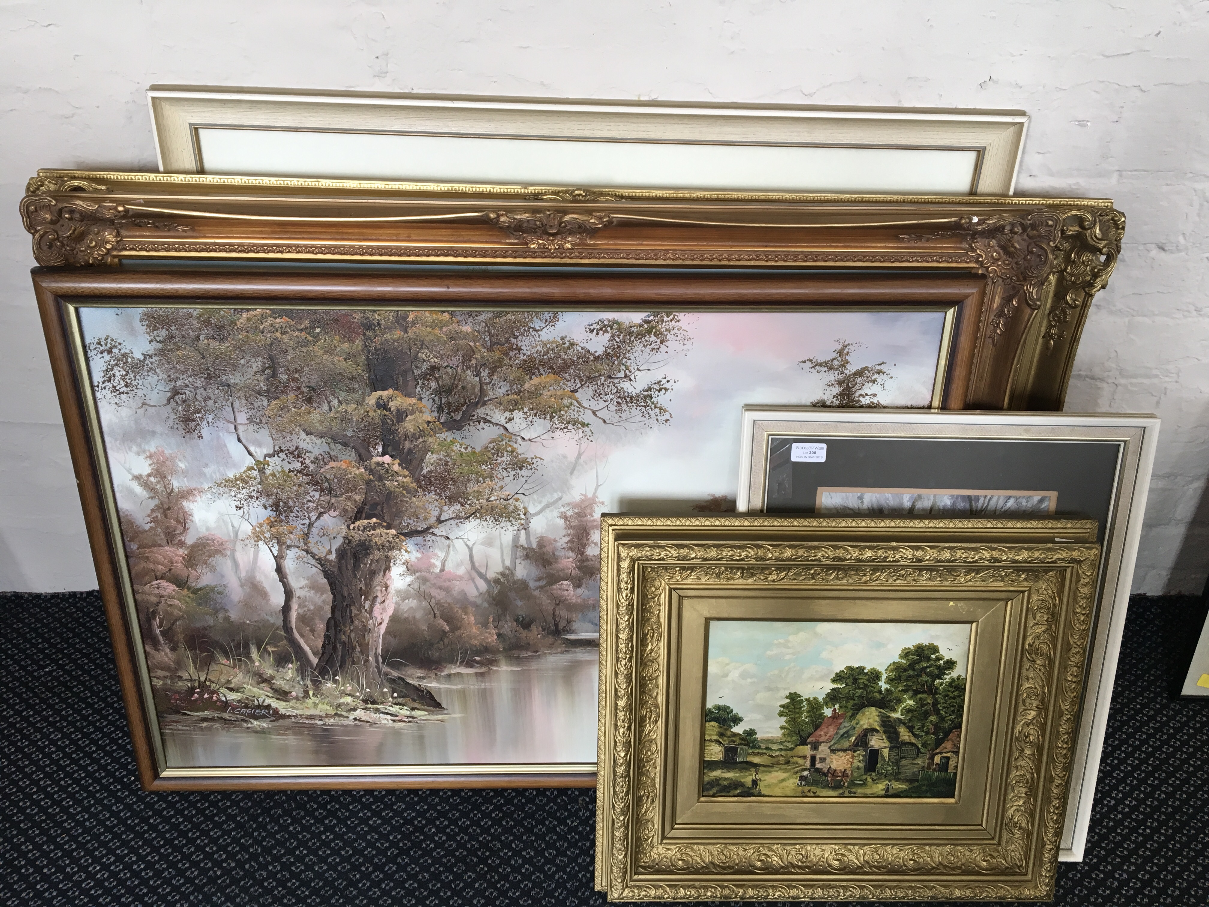 Selection of various framed oils and prints to include a thatched cottage and a maritime scene.