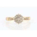 A hallmarked 9ct yellow gold diamond tiered cluster ring, set with three rows of eight-cut diamonds,