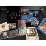 A collection of coins to include Royal Mint sets, England World Cup coin collection, coin box etc.