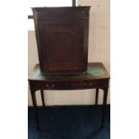 A two door mahogany reproduction side table together with a single door wall cupboard.
