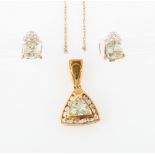 A part suite of prasiolite jewellery, comprising a pendant and chain and a pair of earrings, (