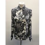 A Stella McCartney floral ladies button up shirt with label size 12/42