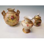 A group of three Royal Worcester pieces to include a bulbous urn with pierced top and floral