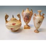 A group of three Royal Worcester urns with floral design, one with gargoyle handles with green