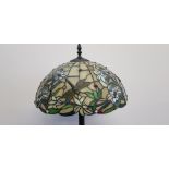 A Standard lamp with Tiffany's style lamp shade