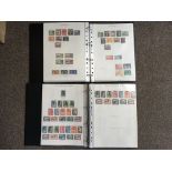 An all world mint and used stamp collection in 6 volumes
