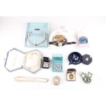 A collection of costume jewellery to include, beads, necklets, brooches, simulated pearls, a
