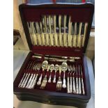 A Flexfit stainless steel cutlery set in mahogany box.