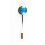 A Liberty & Co. silver and enamel stick pin, the circular metalwork featuring green to blue