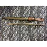 A U.S. bayonet with wooden handle and leather scabbard