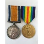 A First World War medal group of two awarded to B. Harston to include Victory Medal and War Medal