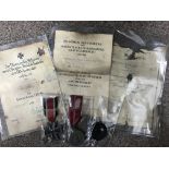 A a group of Second World War medals and badges to include the Iron Cross. Winter War medal and