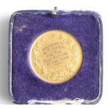 A 9ct yellow gold medal, enamelled ‘Birmingham YMCA School of Landscape Art 1929 Art is Praise’,