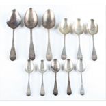 A collection of antique silver spoons, to include three Georgian serving spoons, all hallmarked