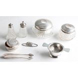 A collection to include two hallmarked silver lidded dressing table hair pots, a hallmarked silver