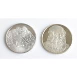 Two Leonardo da Vinci medallions from 'The Genius of Leonardo da Vinci' collection, one featuring