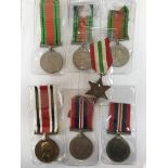 A group of seven medals to include three 1939-45 Defence Medals, a 1939-45 War Medal awarded to A.