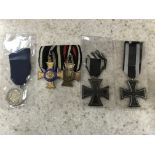 A First World War medal group of two together with two Iron Cross medals and one other medal.