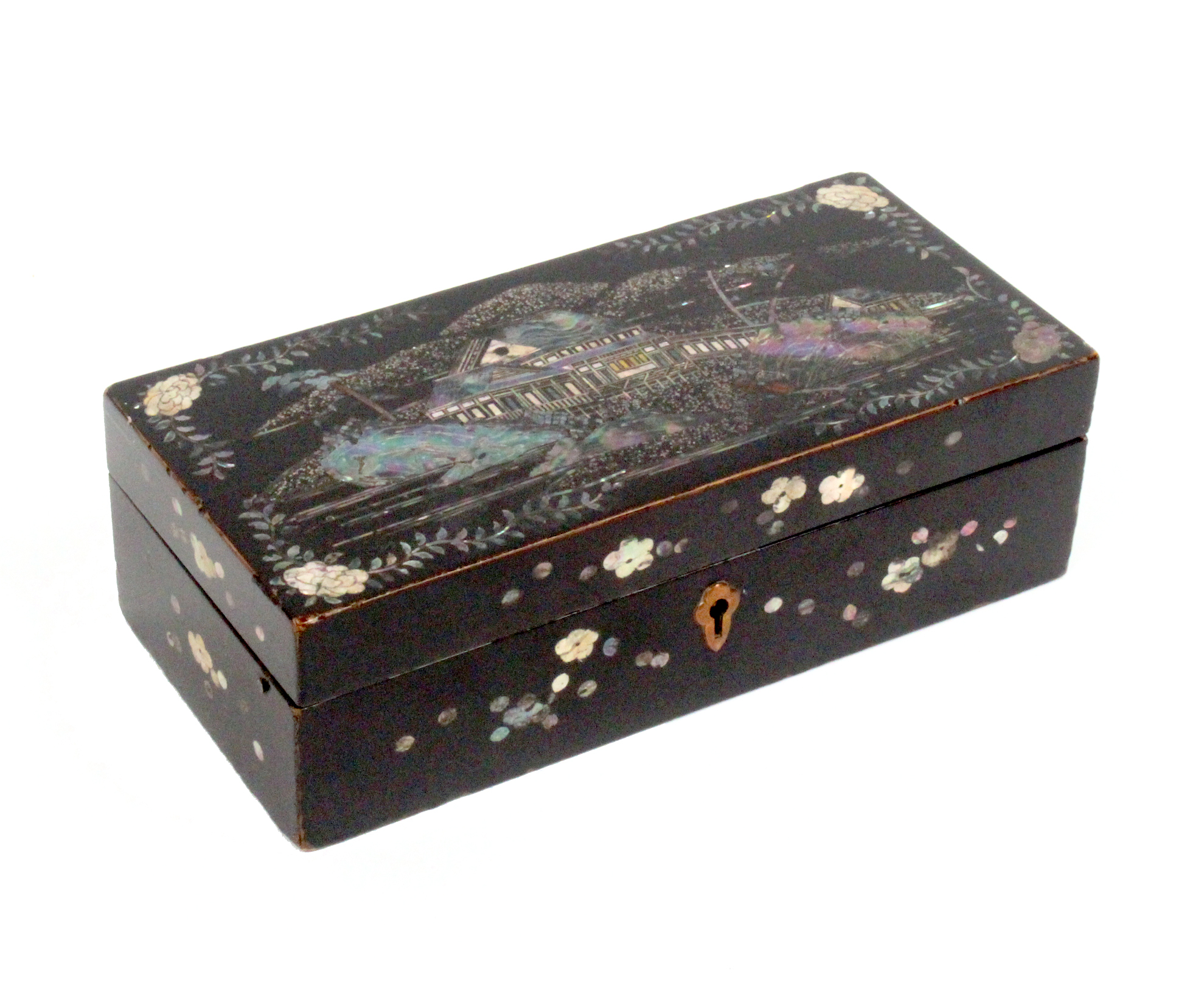 An unusual Japanese black lacquer and pearl inlaid netting box, circa 1830, the lid with a view of a