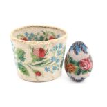 A beadwork wool ball holder and a beadwork darning egg, the holder of tapering circular form