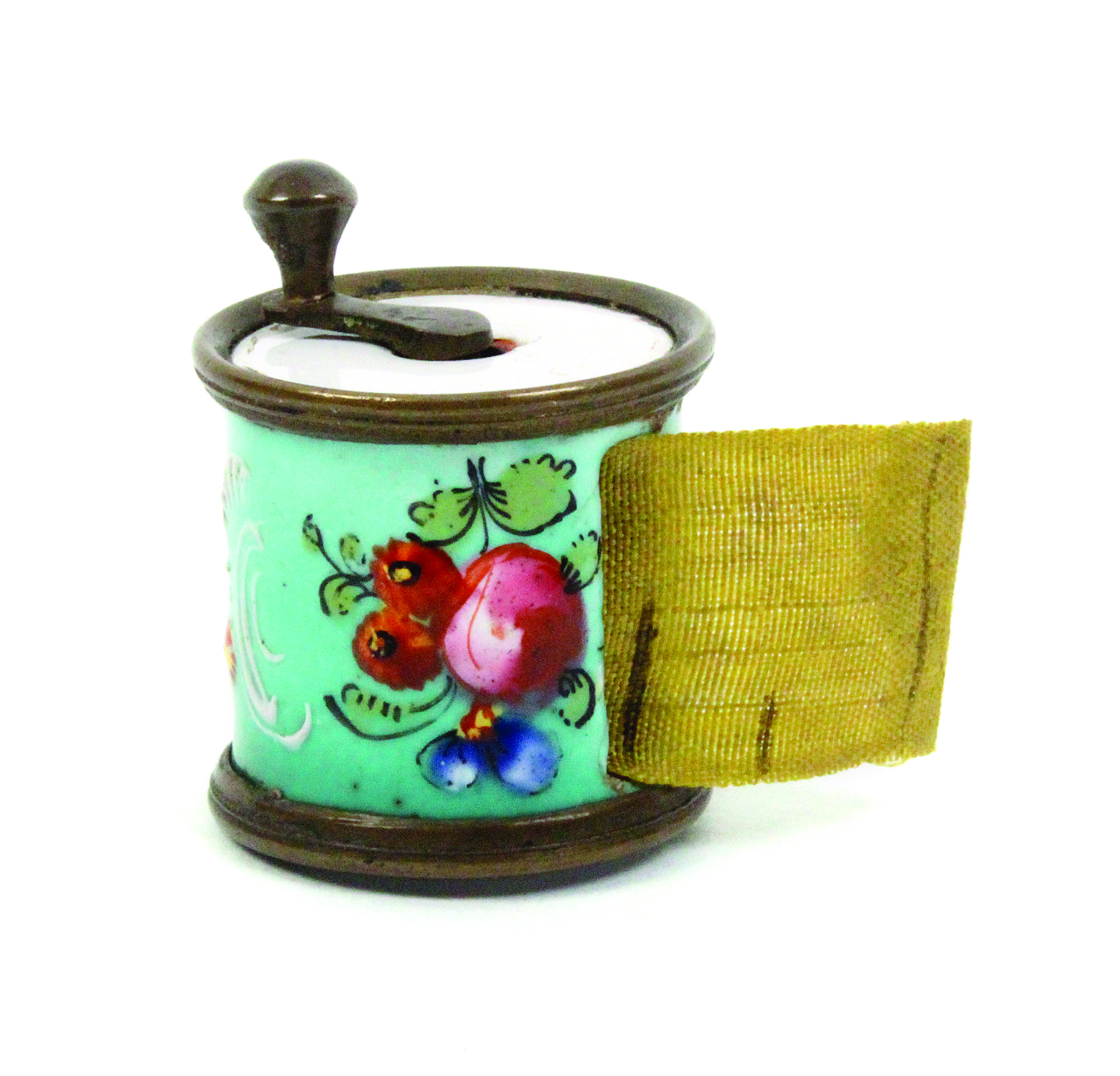 A good English enamel late 18th Century cylinder tape measure the blue ground decorated with