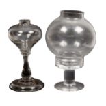 A 19th Century lace makers glass lamp and another modern, the first, with an onion shaped