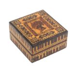 A Tunbridge ware stamp box of rectangular form the sides in geometric banding the lid with a fine