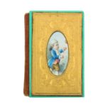 An attractive Souvenir style needle book the decorative fancy gilt metal covers each inset with an