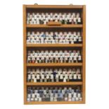 Modern thimbles - mostly ceramic in a display cabinet, 180+, including sets, Wedgwood, Meissen