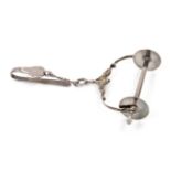 An elegant late 18th Century Dutch silver spool knave, the clip to a shell and scroll mount, the