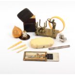 A mixed lot - sewing - comprising a 19th Century brass reel and thimble stand, 9cm, an empty 19th