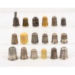 Eighteen various thimbles comprising two over-sized silver examples possibly trade samples, a silver