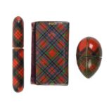 Tartan ware - sewing - three pieces comprising an untitled cylinder bodkin case, 9.5cm, a needle