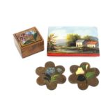 Four pieces of Spa work comprising a needle book each board painted with a landscape view, 7.5cm,