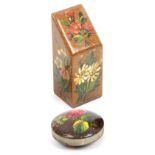 A Spa work needle packet box and a pin cushion, the slant top needle box brightly painted with