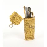 A late 18th Century gilded metal etui of oval section and tapering form, the whole elaborately