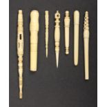 Various sewing tools and other items, comprising a 19th Century slender ivory needle case with