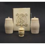 Three 19th Century ivory cotton barrels and a needle book comprising a pair of spindle wind barrels,